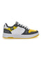 Funky zweifarbige gelbe Sneakers mit Baumwollgürtel