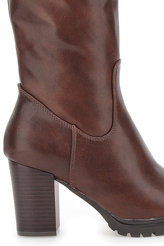 Stivali marroni con tacco alto e suola dentellata Cafè Cost 16807215