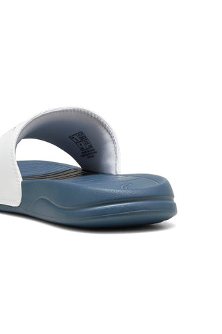 Puma Popcat 20 Jr – blaue Hausschuhe mit weißem Band und rosa Logo