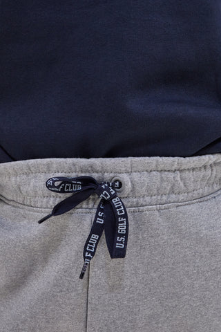 US Golf Club F105 Graue Trainingshose aus Baumwolle und Polyester mit seitlichem Aufdruck