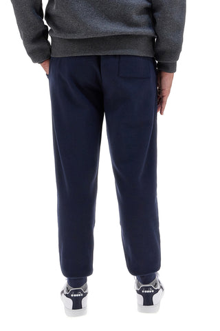 Pantaloni tuta blu in cotone e poliestere con stampa frontale U.S. Golf Club F105