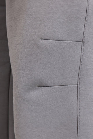 JOMA Step Long Pants graue Jogginghose mit elastischem Bund und Silikonlogo