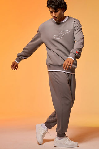 JOMA Step Long Pants graue Jogginghose mit elastischem Bund und Silikonlogo