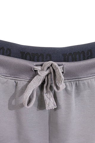 JOMA Step Long Pants graue Jogginghose mit elastischem Bund und Silikonlogo