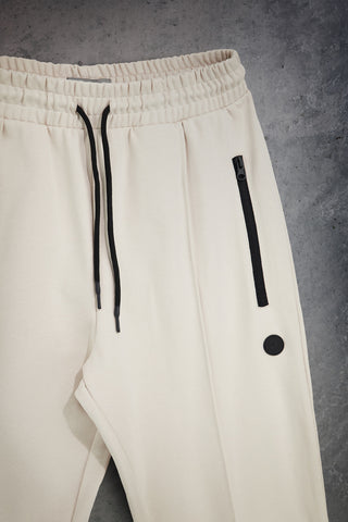 Cremefarbene Jogginghose mit Kordelzug von Boardman Alibi