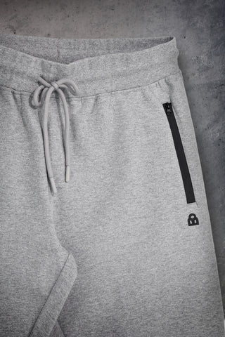 Pantaloni jogger grigi melange in misto cotone felpato con tasche zip Boardman Omertà