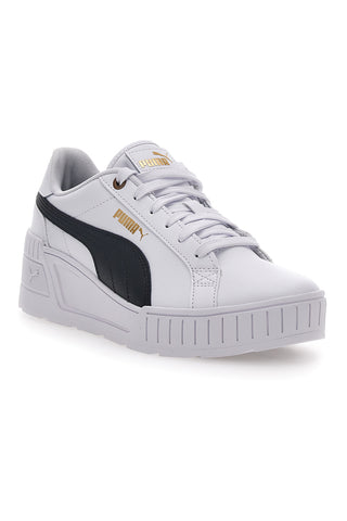 Weiße und schwarze Turnschuhe mit Puma Karmen-Keilabsatz