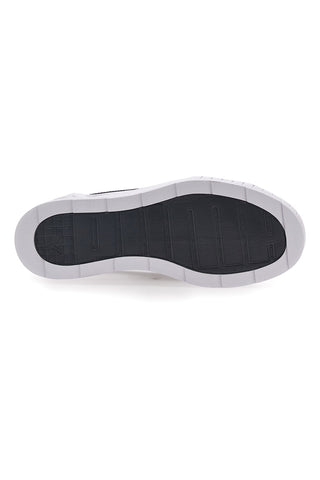 Weiße und schwarze Turnschuhe mit Puma Karmen-Keilabsatz