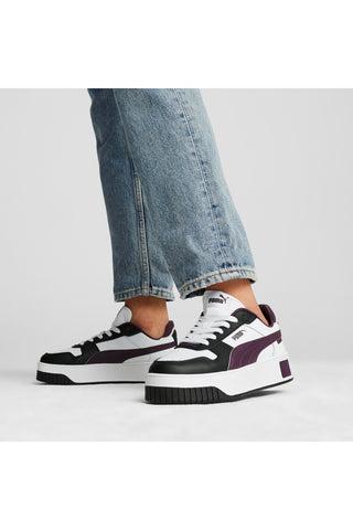 Puma Carina Street weiße und schwarze Turnschuhe