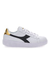 Weiße Sneakers mit schwarzem und goldenem Logo DIADORA GAME STEP SKIN GS