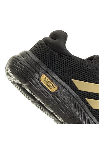 Adidas Cloudfoam Comfy Sneaker in Schwarz mit goldenen Details und Cloudfoam-Sohle