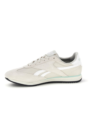 Sneakers grigio con inserti suede e suola nera Reebok World 70