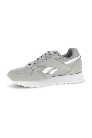 Sneakers grigio in tessuto con inserti sintetici Reebok Prime Event