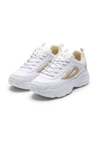 Sneakers bianche con dettagli oro e suola chunky Fila Skye ZP