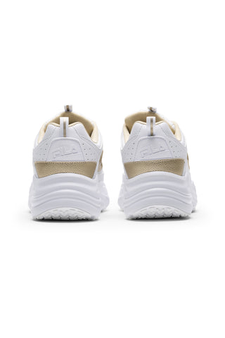 Sneakers bianche con dettagli oro e suola chunky Fila Skye ZP