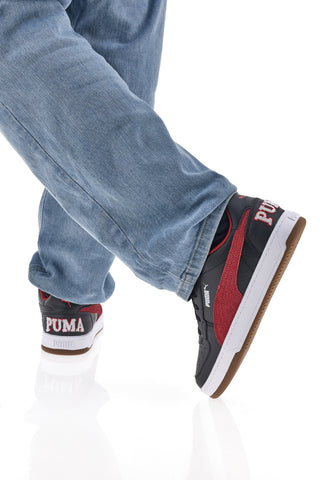 Schwarze Turnschuhe mit seitlichem String Puma Caven 2 Retro