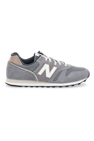 Graue New Balance 373-Sneaker mit Einsätzen aus echtem Leder