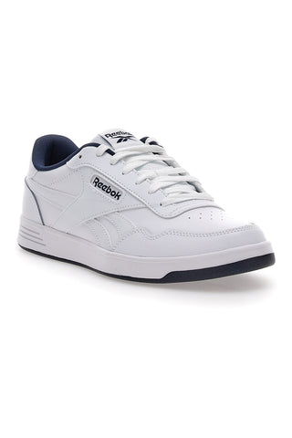 Weiße und schwarze Turnschuhe mit Mikrobläschen Reebok Court Advance