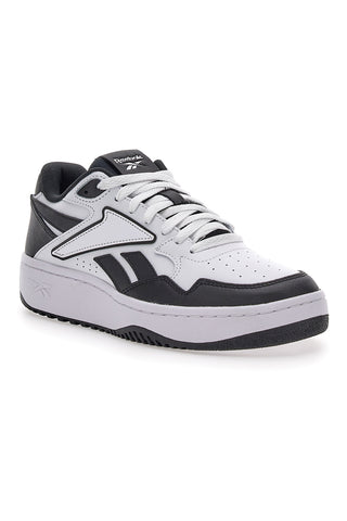 Weiß-schwarze Reebok Art Chill Sneakers