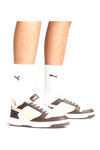Sneakers con lacci marroni e bianche Puma Rebound V6 Low