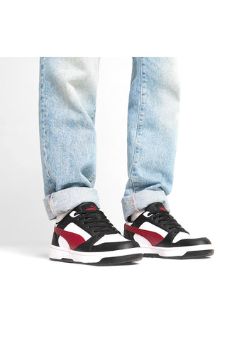 Schwarze, weiße und rote Puma Rebound V6 Low-Sneaker