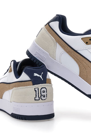 Weiße Sneaker mit blauen und goldenen Details Puma RBD Game Low Retro Club