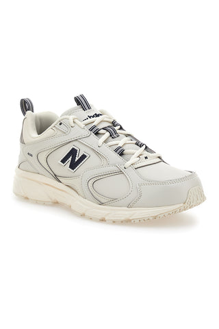Beige Sneakers mit marineblauen Details New Balance ML408Q