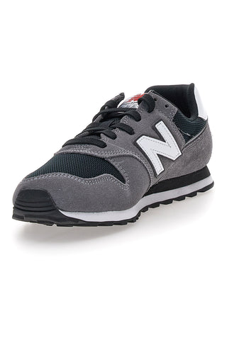 Graue Sneakers New Balance ML373XE2 mit seitlichem Logo