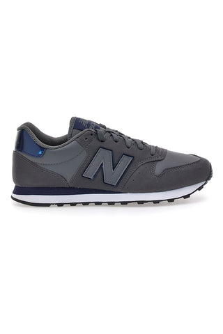 Sneakers grigie con dettagli blu New Balance GM500DGN