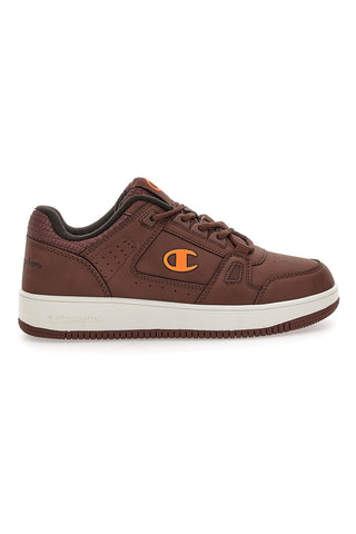 Braune Sneakers mit orangefarbenem Champion RD18 LOW COMB B GS-Logo