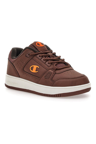 Braune Sneakers mit orangefarbenem Champion RD18 LOW COMB B GS-Logo