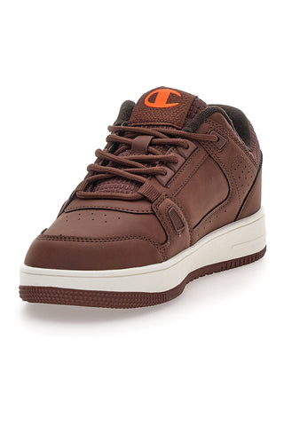 Braune Sneakers mit orangefarbenem Champion RD18 LOW COMB B GS-Logo