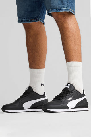 Schwarze Sneakers mit weißen Details und SoftFoam+-Einlegesohle Puma ST Runner v4 L