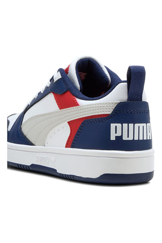 Blaue und rot-weiße Turnschuhe im Basketball-Stil Puma Rebound V6 Lo Jr