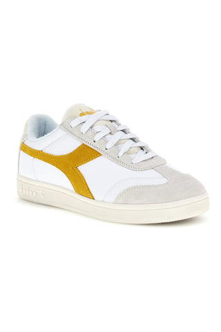 Weiße Turnschuhe mit gelbem Einsatz Diadora Kick Sl