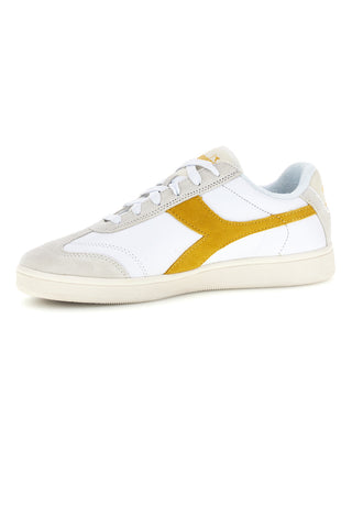 Weiße Turnschuhe mit gelbem Einsatz Diadora Kick Sl