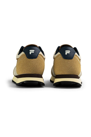 Beige Turnschuhe mit blauen Fila Hyper Einsätzen