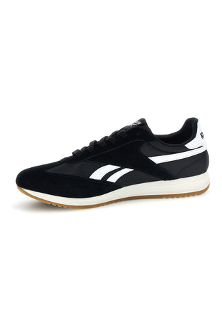 Schwarze Turnschuhe mit Wildledereinsätzen und Ortholite Reebok World 70