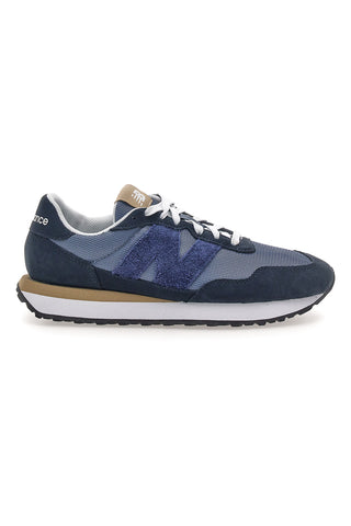 Sneaker blu inserti in pelle New balance M2374EK