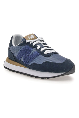 Sneaker blu inserti in pelle New balance M2374EK