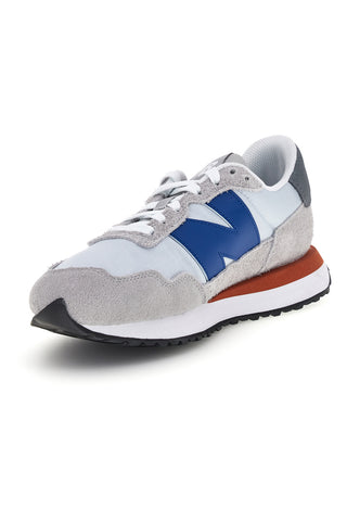 Graue Turnschuhe aus Leder und Stoff New balance M2374SC