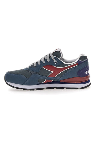Blaue Sneaker mit burgunderroten Details und DD Comfort Diadora N.92 Technologie