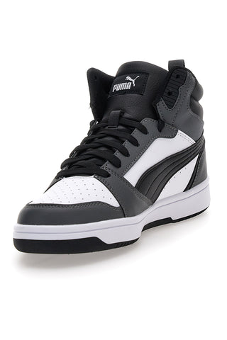 Puma Rebound V6, schwarz-weiße Mid-Cut-Sneaker mit kontrastierenden Einsätzen