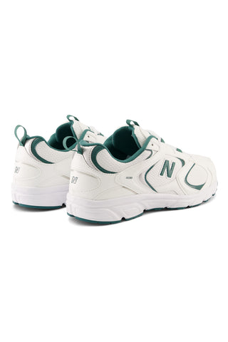 Weiße und grüne New Balance ML408T Sneaker