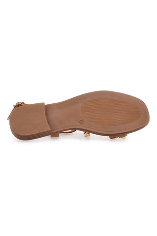 Braune Sandalen mit flacher Sohle und Nieten The First 313811