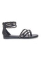 Cafè Cost 667 – Flache Flip-Flop-Sandalen in Schwarz mit geflochtenen Glitzerbändern