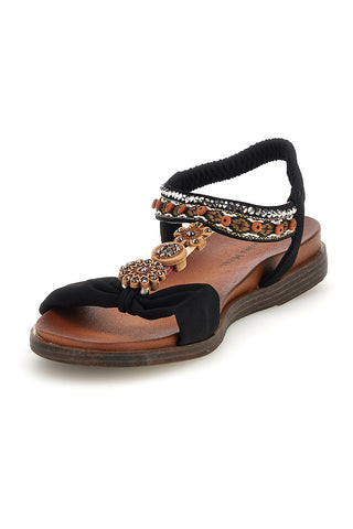Schwarze Sandalen mit Schmucksteinverzierung und elastischem Riemen Quanna mel 560319