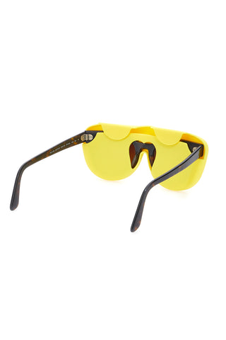 Gelber flexibler Brillenhalter aus Silikon Indigeno Metropolitano 2