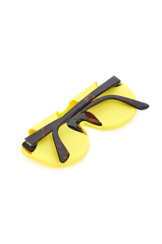 Gelber flexibler Brillenhalter aus Silikon Indigeno Metropolitano 2