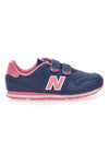 Blaue Sneakers New Balance 500 mit rosa Details und Klettverschluss
